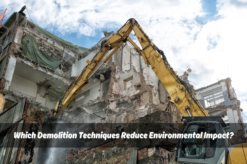 Image of a modern electric demolition excavator with a sorting claw attachment on its arm, sifting through a pile of concrete rubble on a demolition site. Text overlay: Which Demolition Techniques Reduce Environmental Impact?