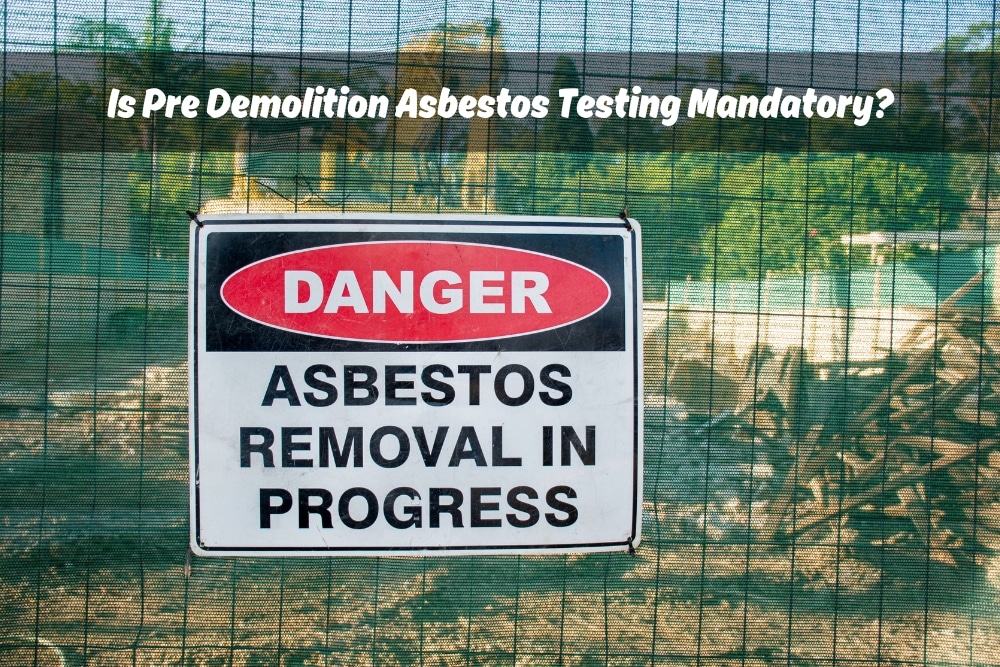 Sign reading 'Danger: Asbestos Removal in Progress' at a construction site, emphasizing the importance of demolition asbestos testing before starting work.