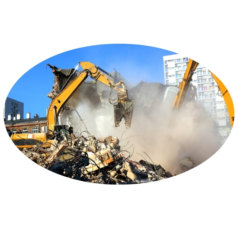 Demolition Gosford: Powerful excavators tearing down a building, creating a cloud of dust.