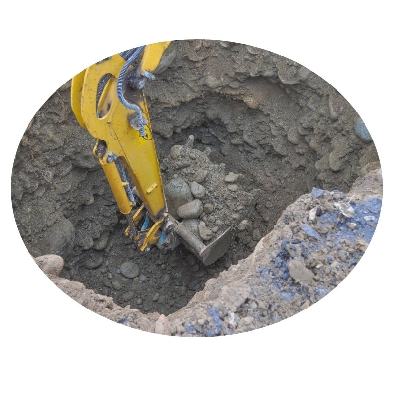 Excavation contractor using a backhoe to dig a deep hole in Port Stephens.