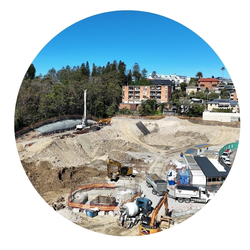 Excavation Newcastle site with heavy machinery preparing foundation for construction project
