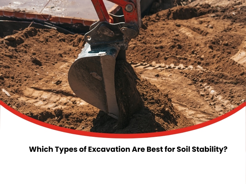 Excavator bucket digging soil close-up to illustrate types of excavation for stability.